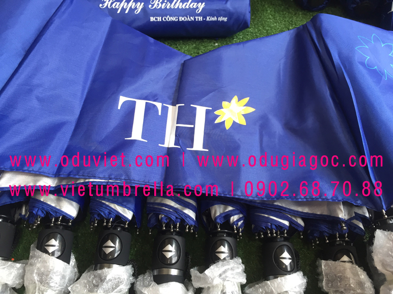 xưởng sản xuất ô dù cầm tay in logo quảng cáo